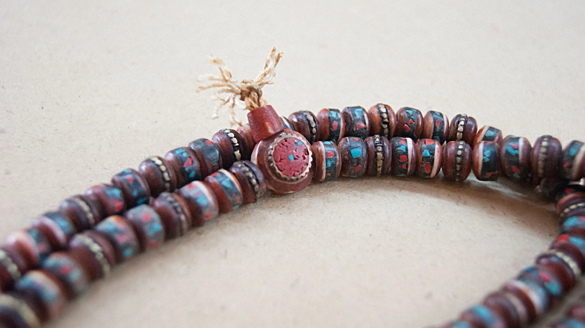 Amber with turquoise and coral inlay