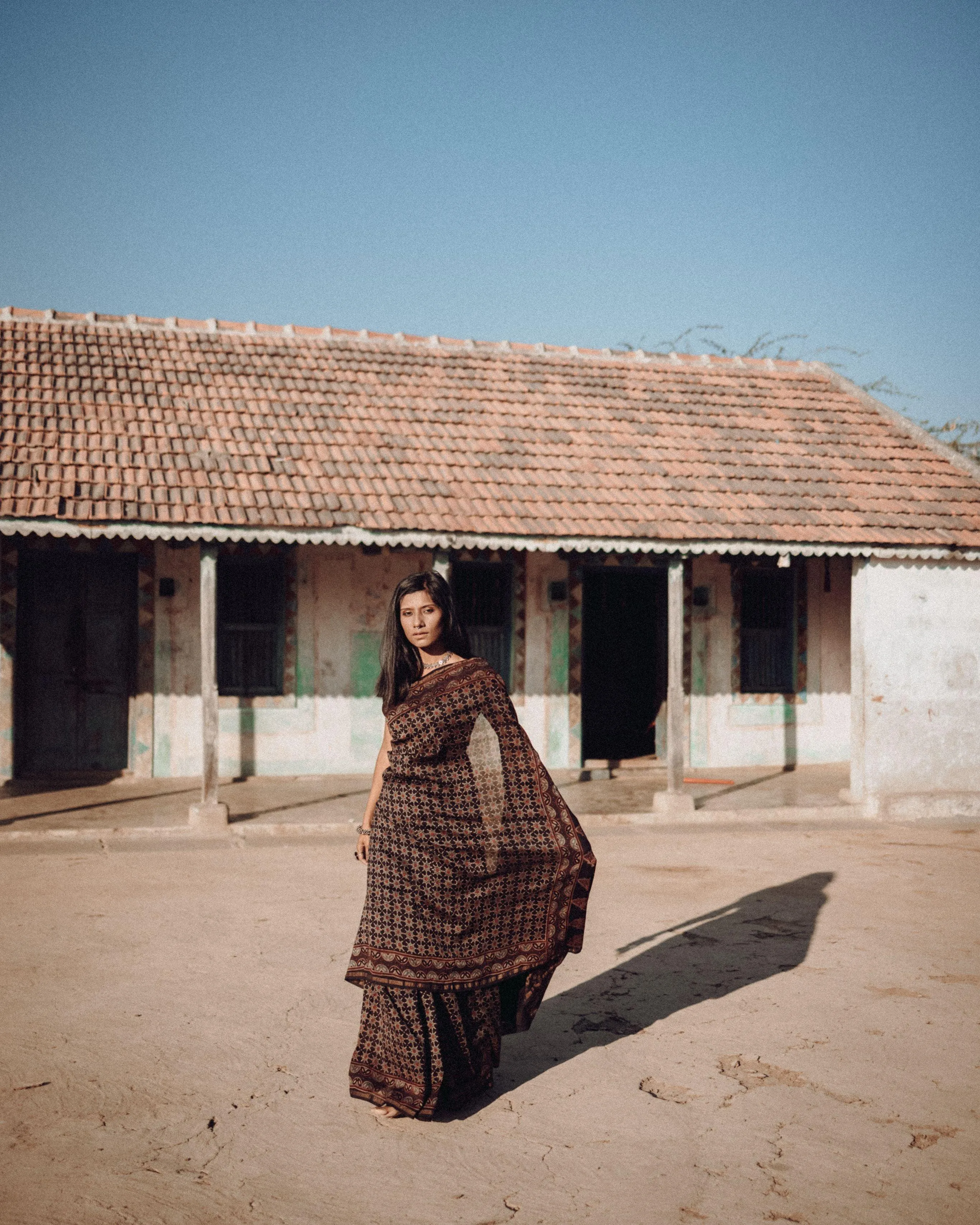 Jharokha -Black silk cotton Ajrakh handblockprinted saree