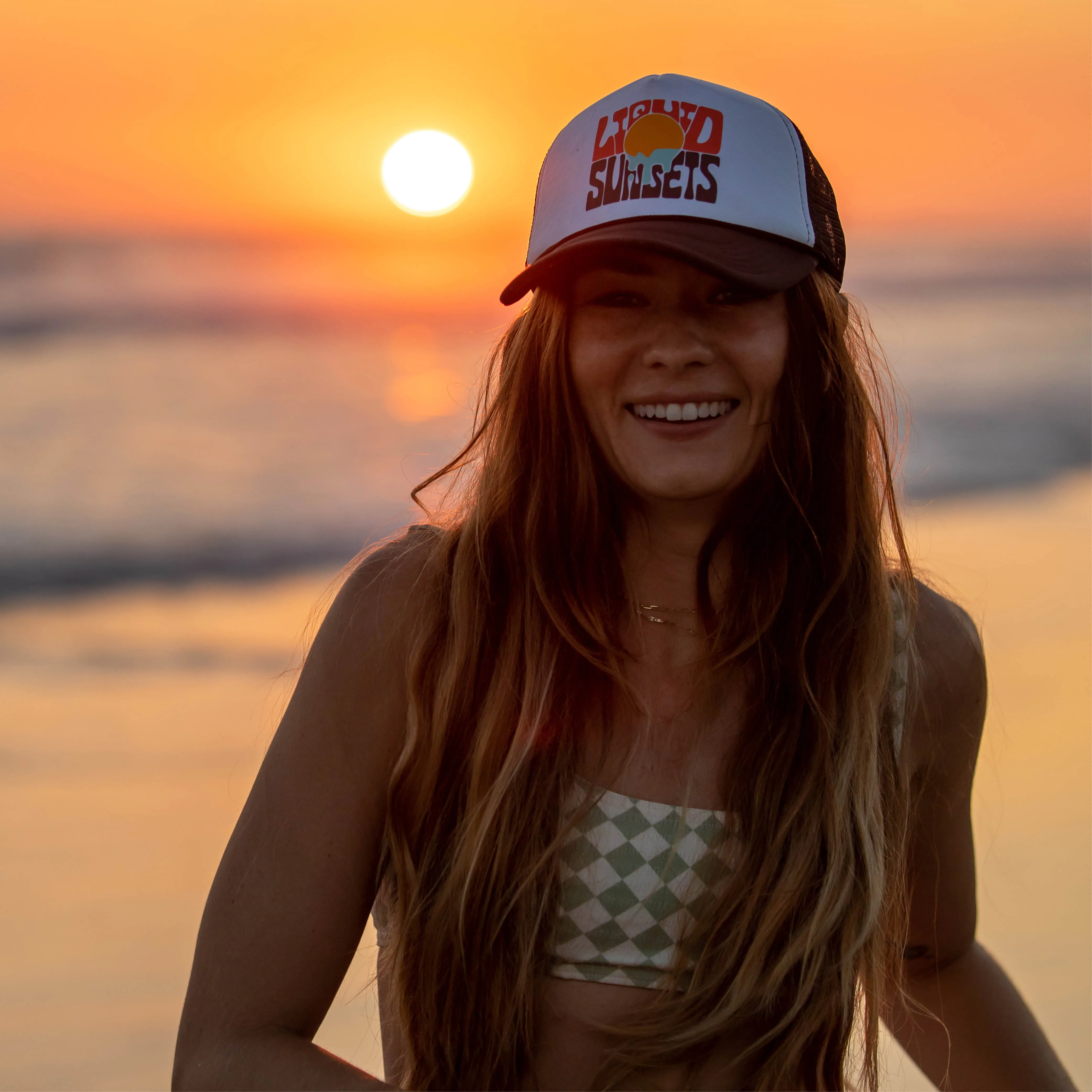 LIQUID SUNSETS TRUCKER HAT