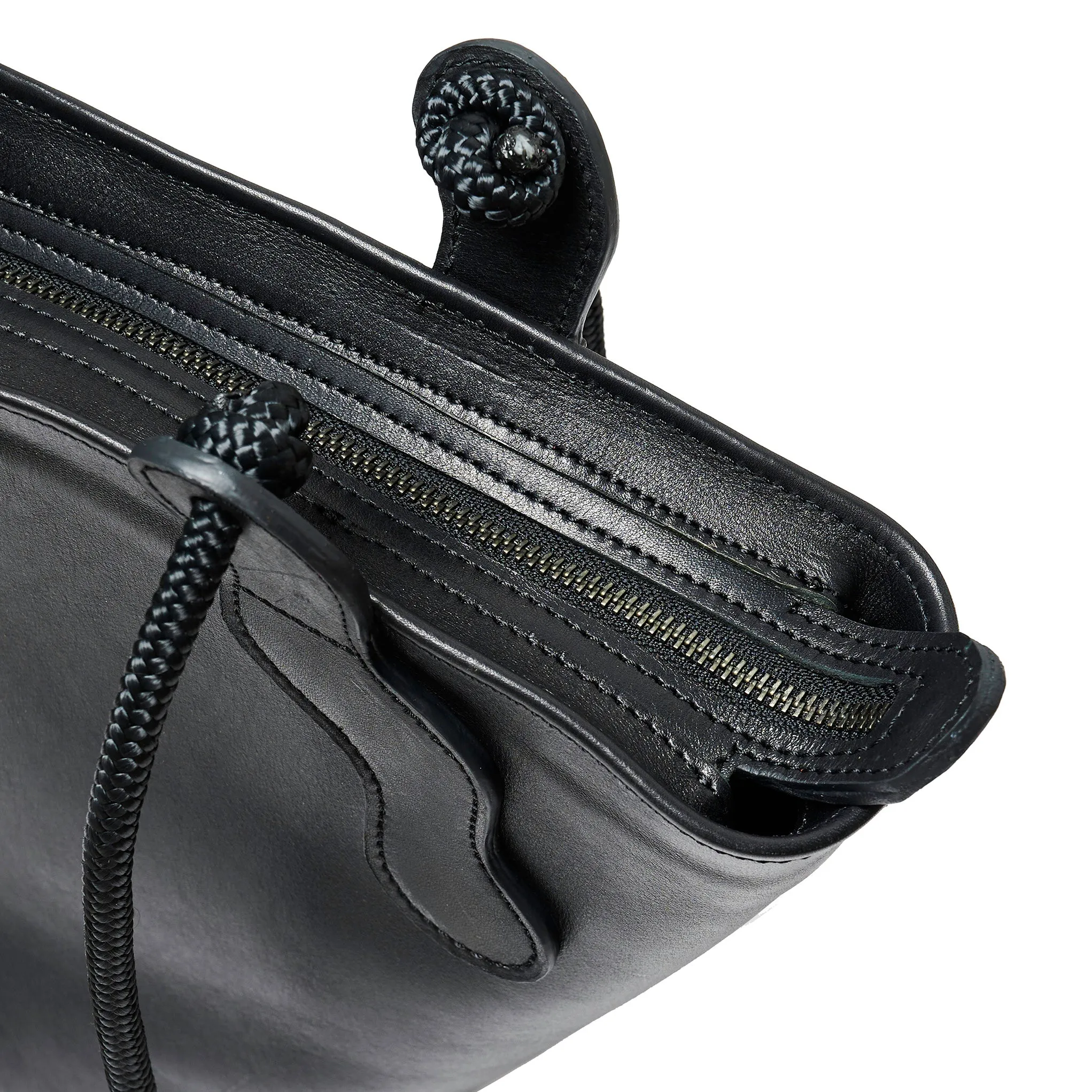 Project Dyad || Black Color trapeze-shaped cow leather Inner small pocket Rope handle Emele Zipper Bag